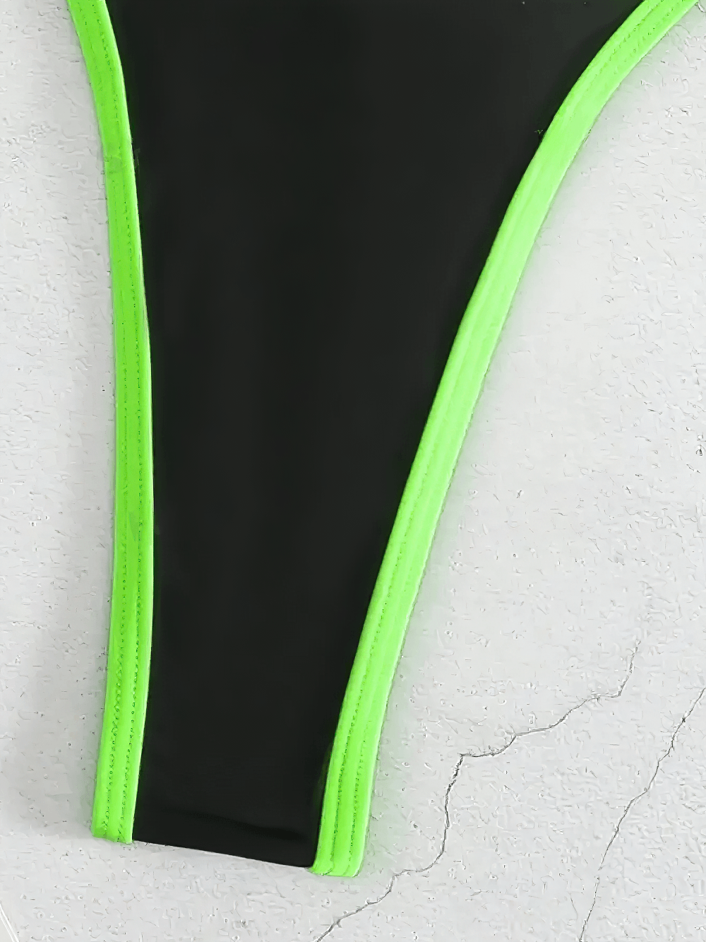 Neon Trim Strappy Halterneck Monokini Swimwear - SF4729 close-up of black bottom with neon green trim.