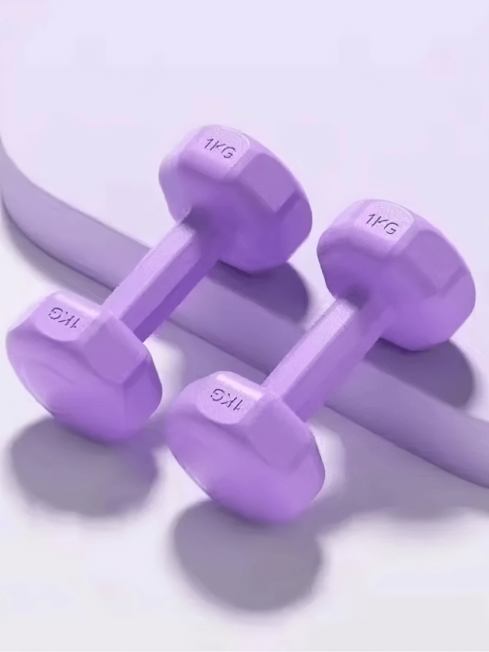 Purple neoprene-coated hex dumbbells, 1kg each, non-slip grip for home gym fitness and strength training, stylish and functional.