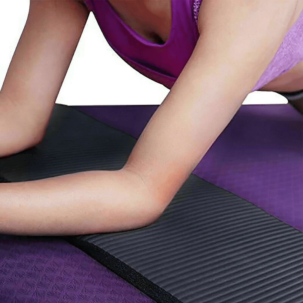Person using a purple non-slip EVA yoga mat, showcasing anti-slip stripes and honeycomb texture for stability during workouts.