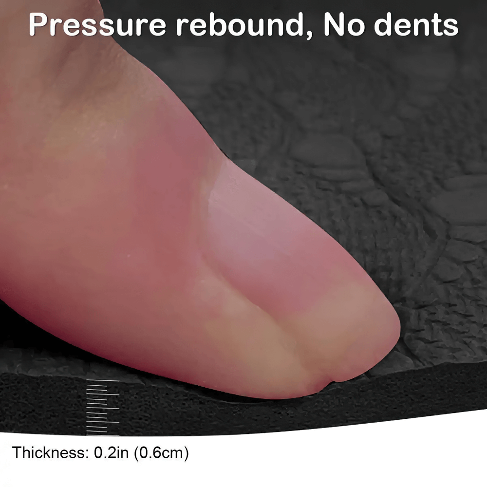 Close-up of a finger pressing into the SF3408 fitness mat, demonstrating pressure resistance and no dents, with thickness of 0.2in (0.6cm).