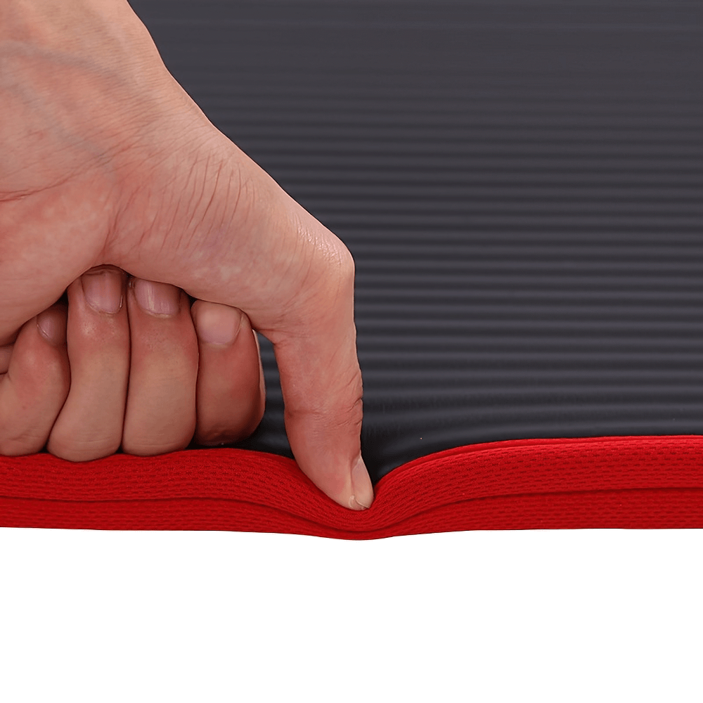 Close-up of durable non-slip NBR yoga mat with textured surface, showcasing thick padding and excellent grip for workouts and fitness.