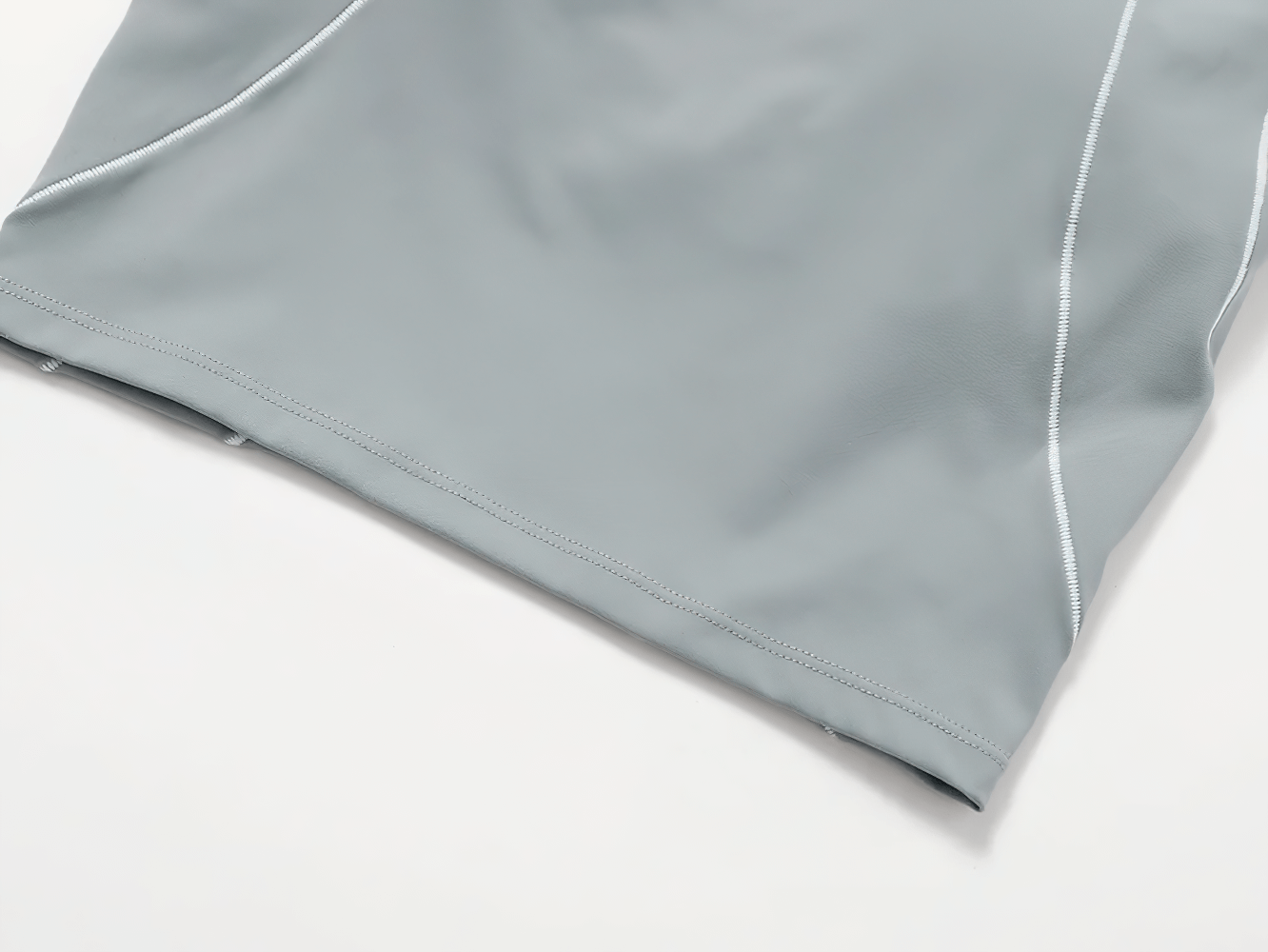 Close-up of a sleek grey nylon yoga top from the 2pcs Yoga Set SF2404, showcasing its breathable, quick-dry fabric for fitness and running.