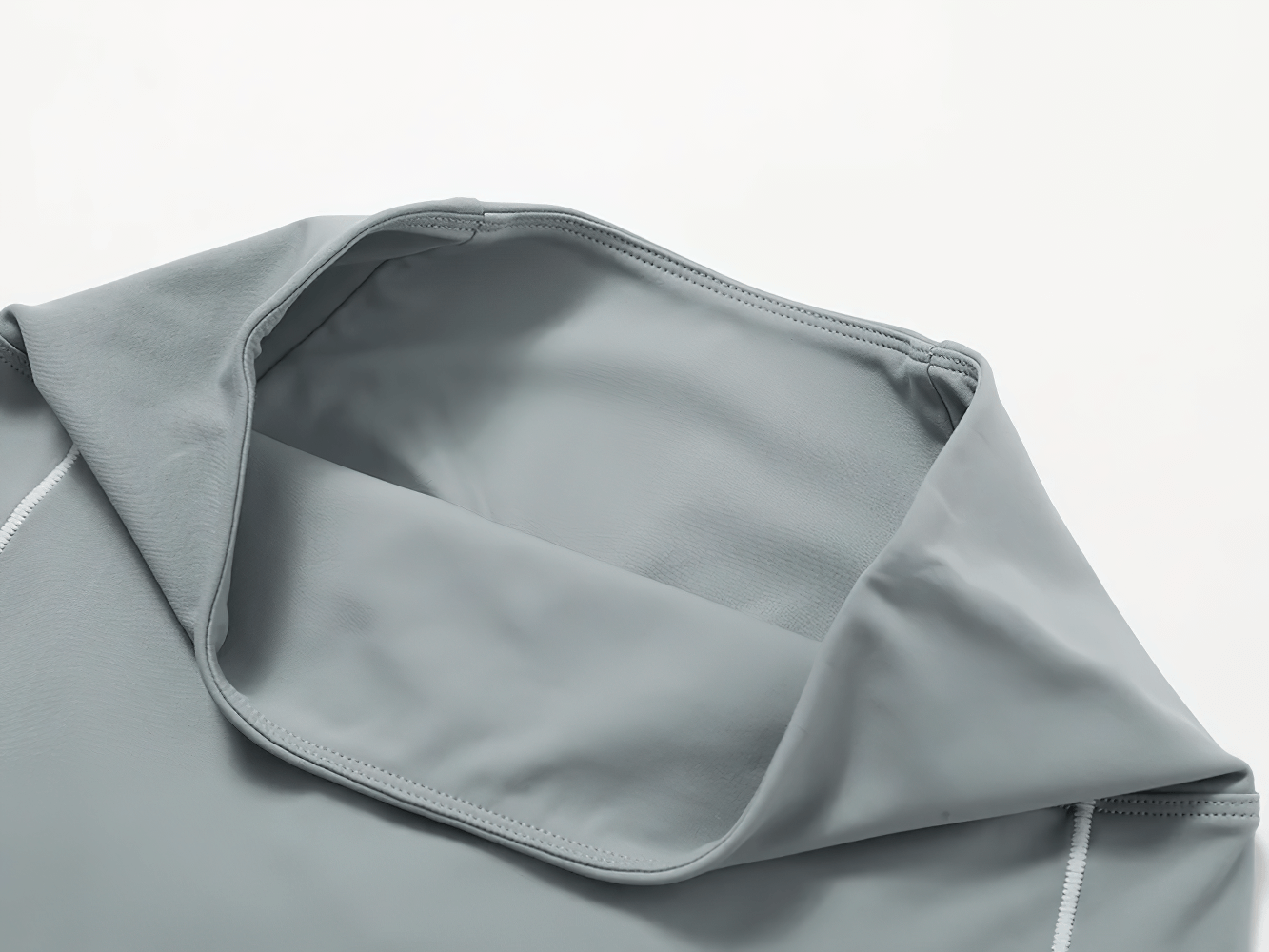 Close-up of soft grey nylon tube top part of Yoga Set SF2404, showcasing its breathable, quick-dry fabric detail.