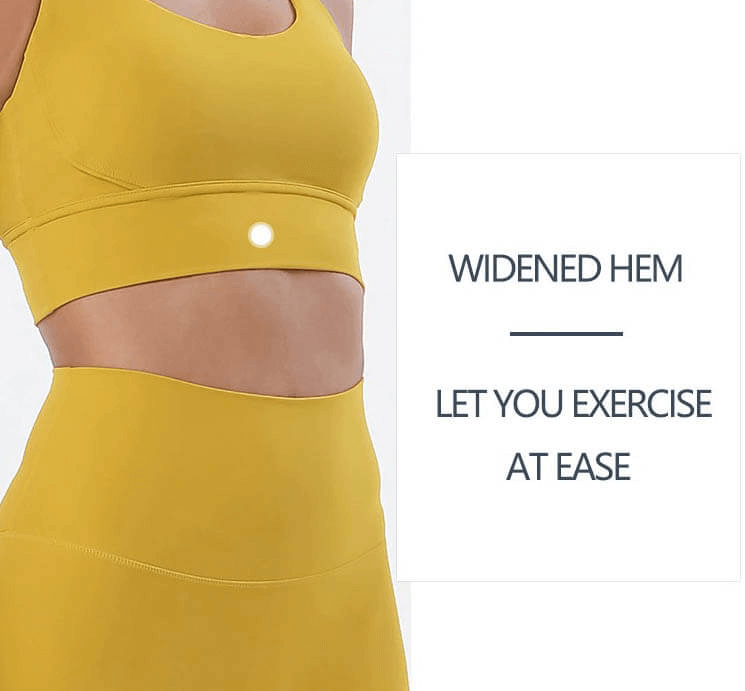 Yellow nylon sports top with cross shoulder straps and widened hem for comfort during exercise, perfect for yoga and gym.