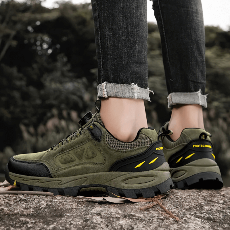 Person wearing Outdoor Breathable Non-Slip Men's Trekking Shoes, SF1635 model, on a scenic trek. Perfect for your next adventure!