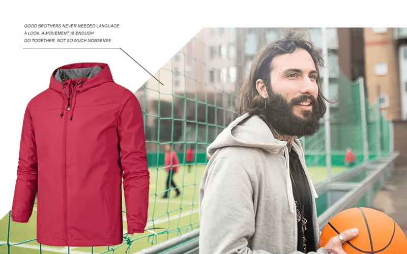 Man holding basketball wearing gray hoodie next to red Outdoor Hooded Waterproof Windbreaker Jacket, perfect for staying dry and warm.