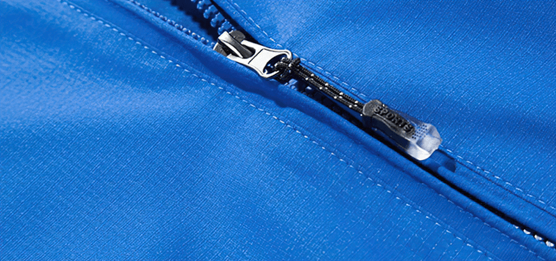 Close-up of blue waterproof windbreaker with hood, featuring a durable zipper design for secure fit, model SF1985 for men.