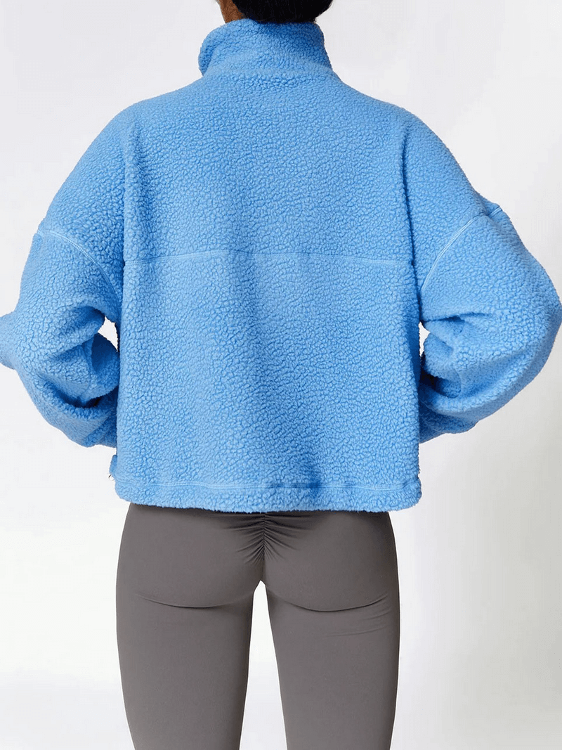 Back view of blue Outdoor Long Sleeves Zipper Sports Fleece Jacket - SF1826, perfect for yoga and outdoor activities, worn by woman.