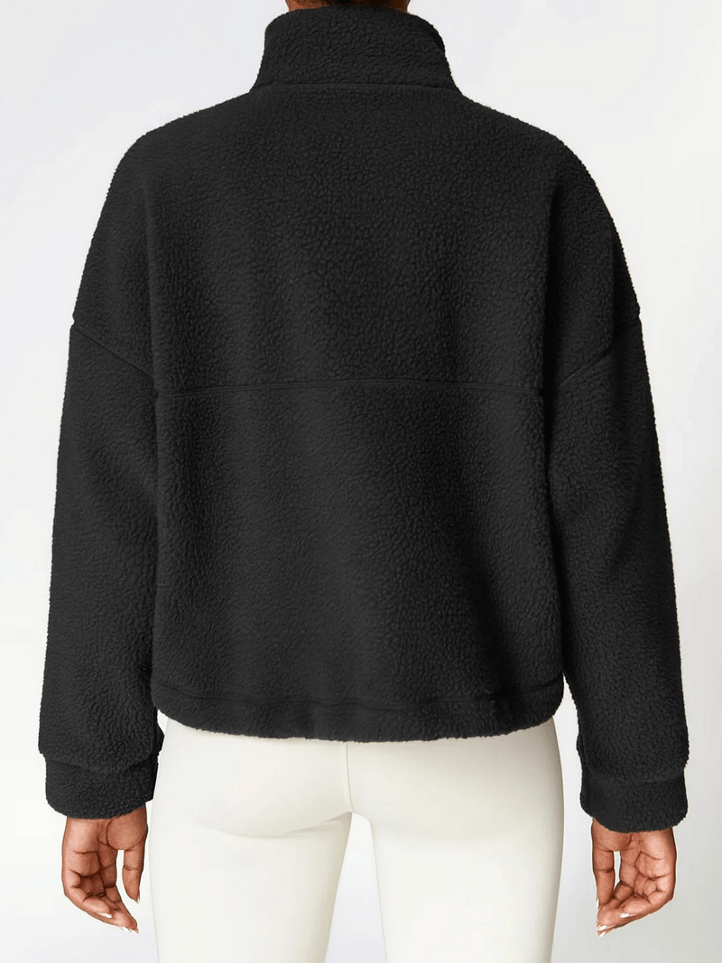 Back view of Outdoor Long Sleeves Zipper Sports Fleece Jacket for women in black, ideal for yoga and sports activities.