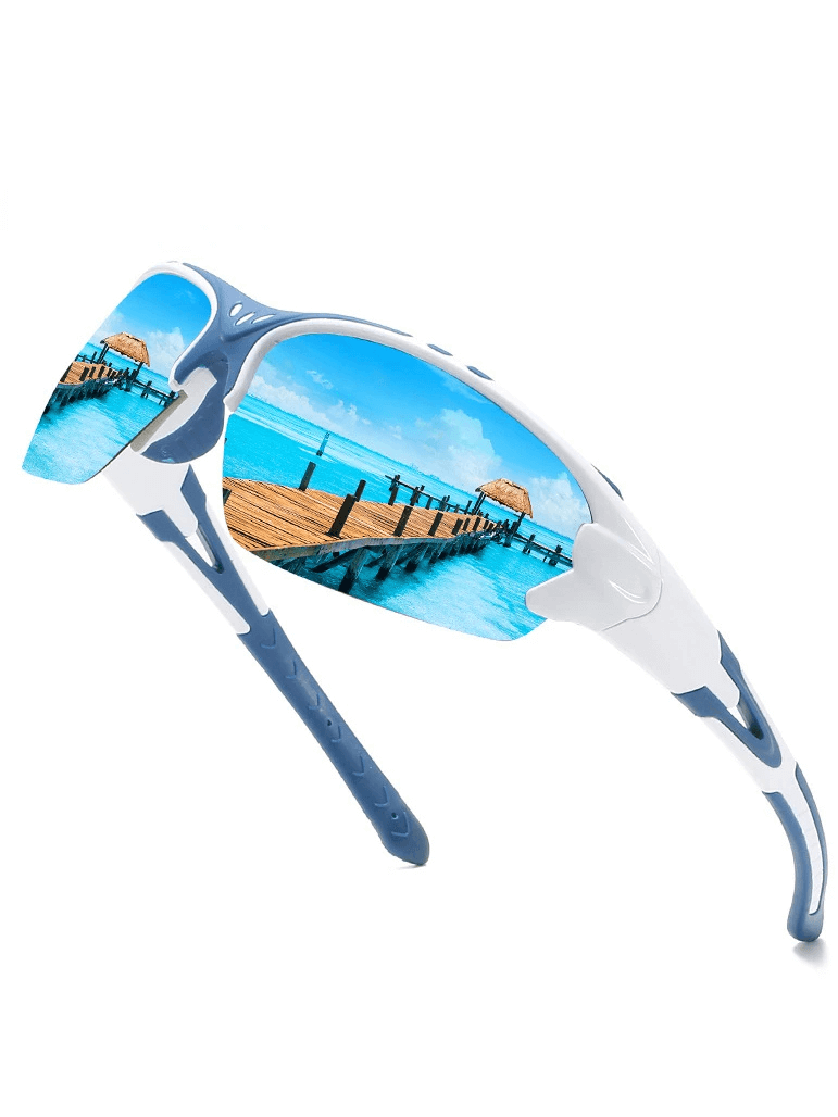 Blue and white outdoor sports sunglasses with UV protection and wrap-around frame, reflecting a scenic ocean view in the lenses.