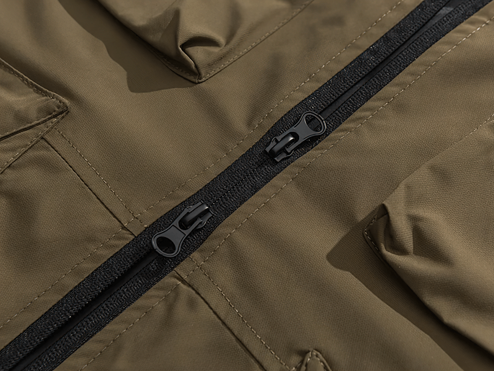 Close-up of a lightweight tactical utility vest with durable zippers and multiple pockets, perfect for outdoor adventures.