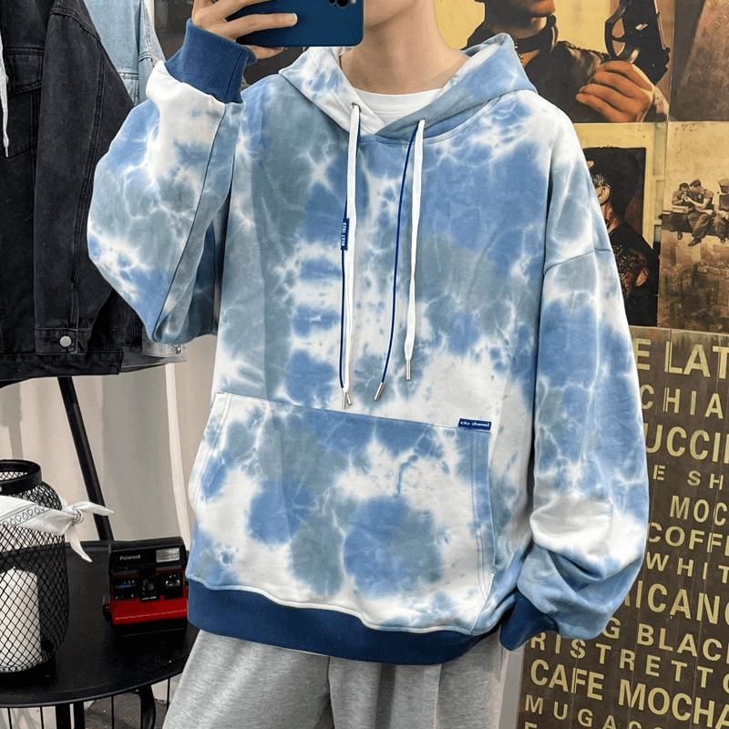 Oversized cotton hoodie with blue tie-dye print for men, relaxed fit, breathable fabric, perfect for casual outings.