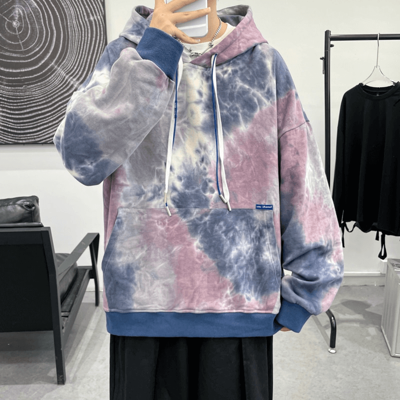 Oversized cotton hoodie with tie-dye print, perfect for men seeking comfort and style in a relaxed fit, featuring a hood and breathable material.