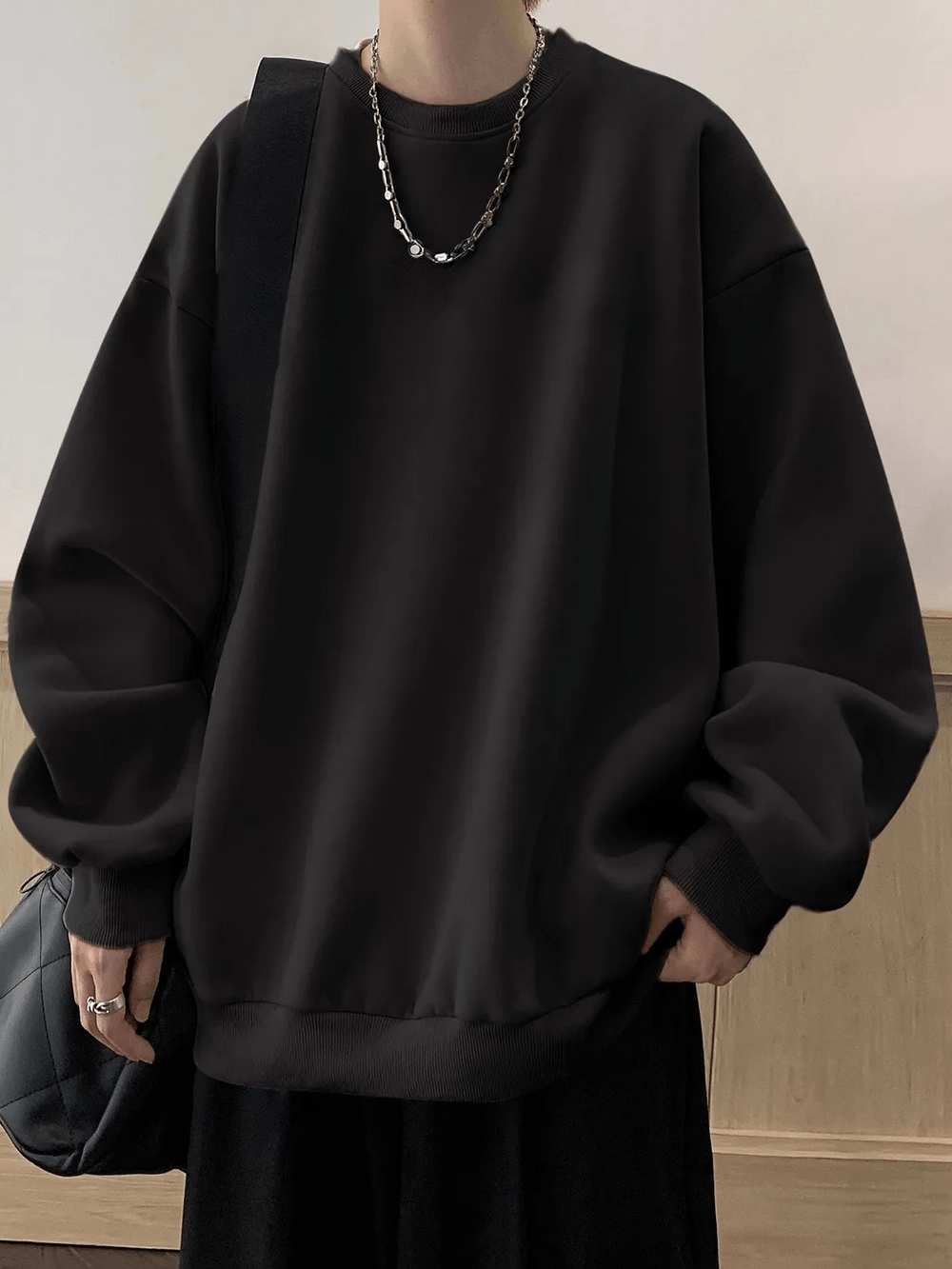 Oversized Crewneck Sweatshirt with Drop Shoulders - SF4646 in solid black, featuring drop shoulders and long sleeves.