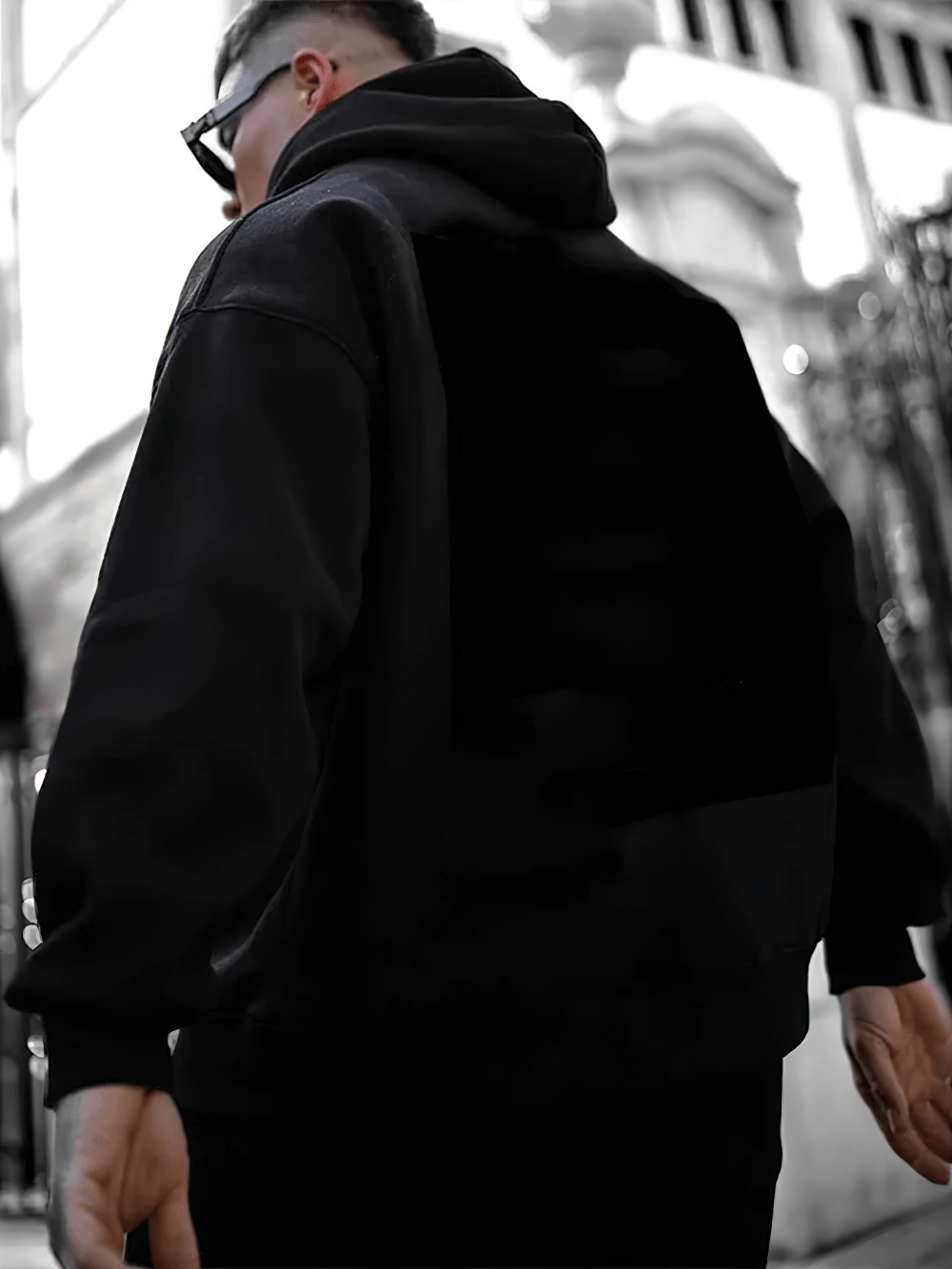 Oversized Paris Print Hoodie with Kangaroo Pocket - SF4701 worn from behind, showcasing its minimalist design.