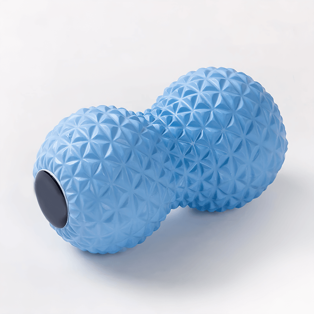 Blue peanut-shaped massage ball with spiky texture for muscle tension relief and stress reduction.
