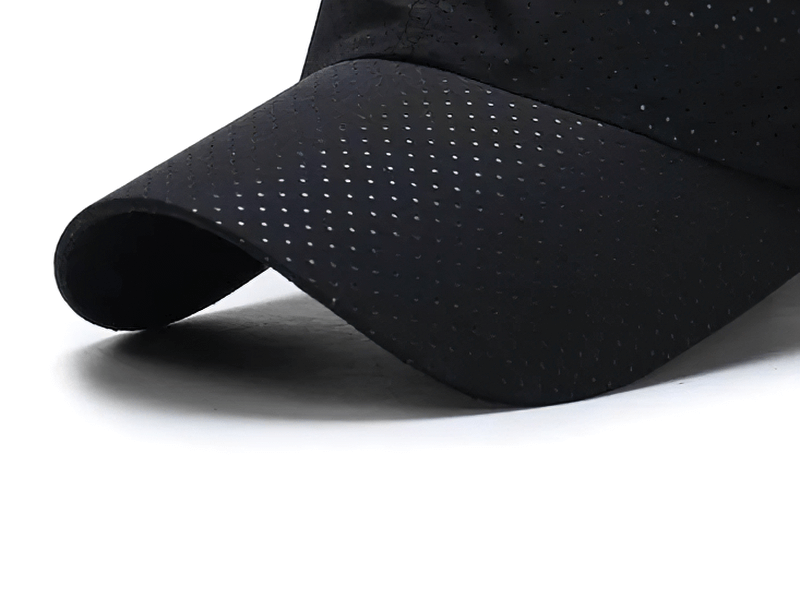 Sleek perforated baseball cap with breathable design, perfect for sports. Unisex adjustable fit, item SF2236 in black.