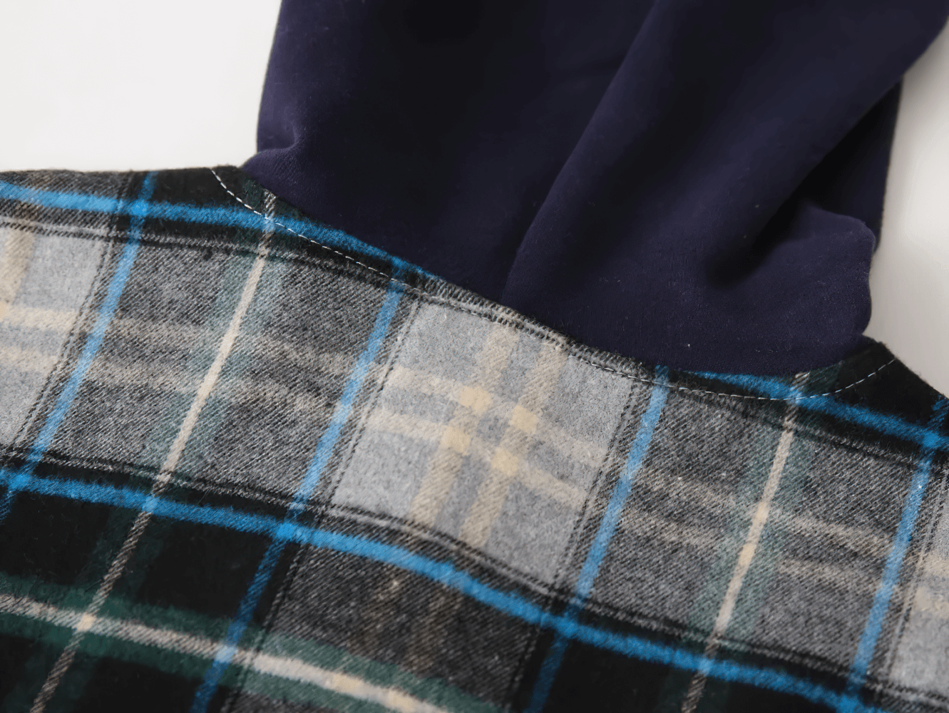 Close-up of Plaid Hooded Long Sleeved Shirt for Boys and Girls - SF3524, highlighting the soft flannel and hood design in blue and gray tones.