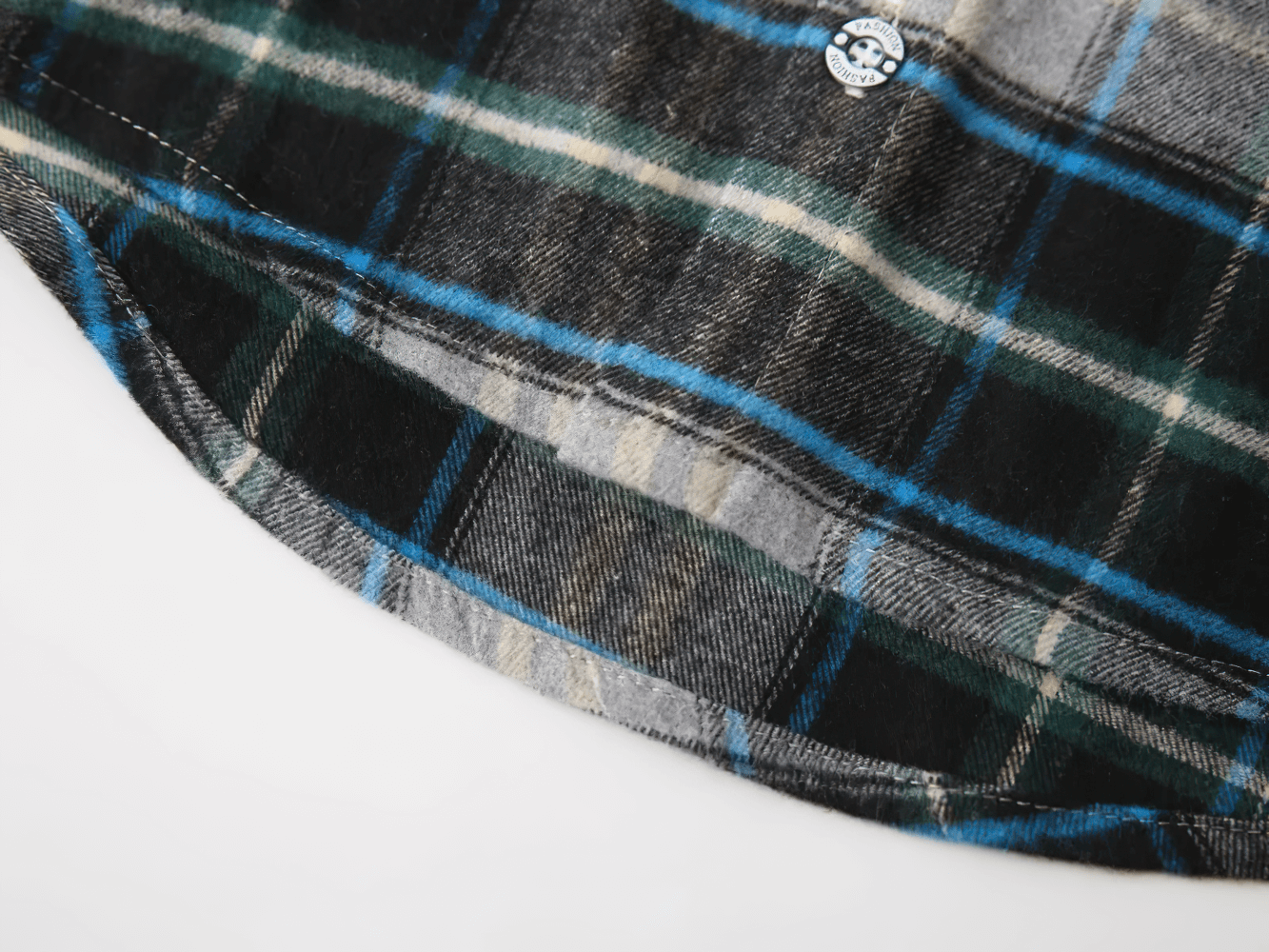 Close-up of blue and grey design on Plaid Hooded Long Sleeved Shirt for Boys and Girls - SF3524 with button detail.