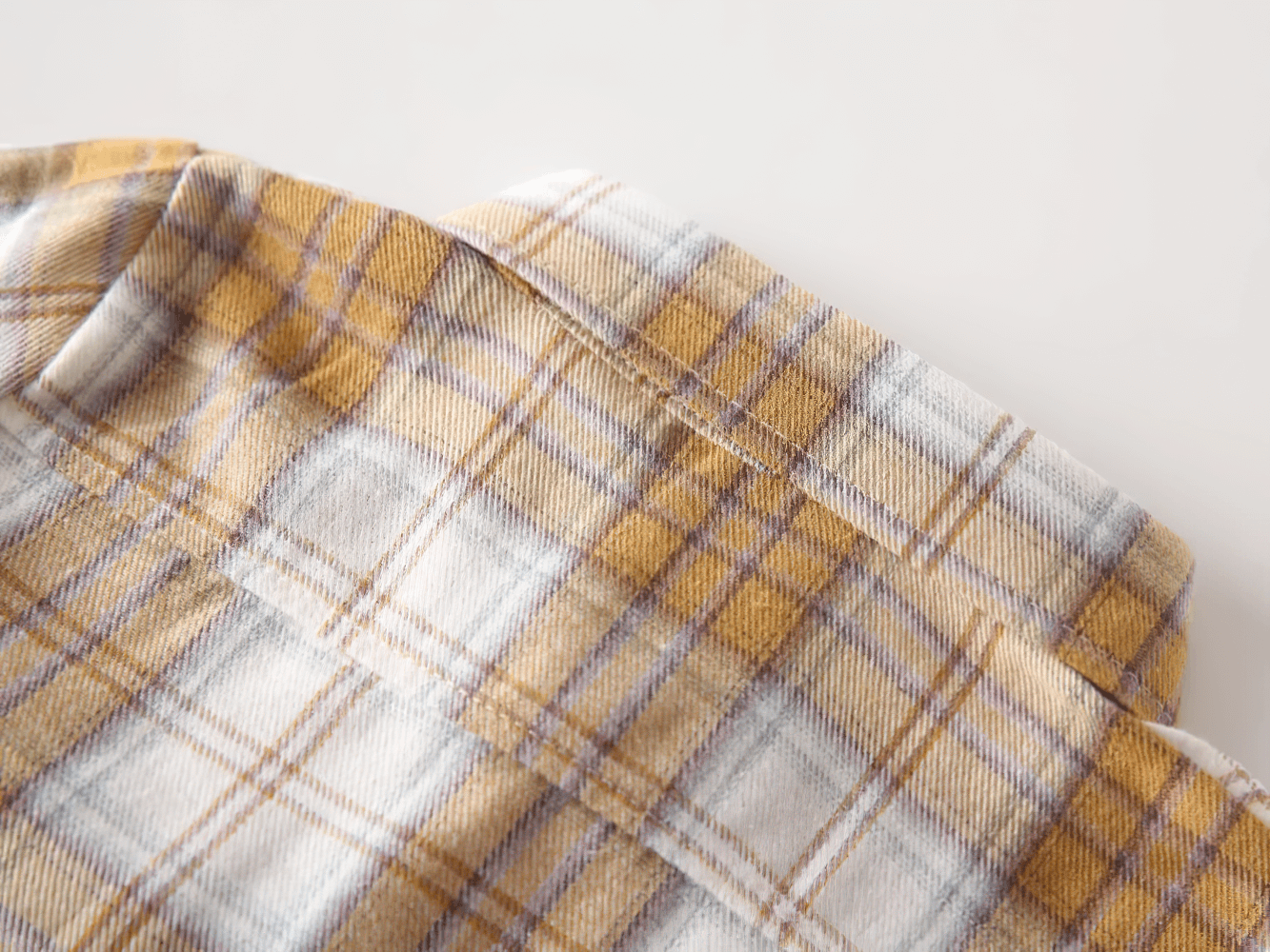 Close-up of Plaid Long-Sleeved Toddler Boys Flannel Shirt - SF3521 in yellow and white check pattern showcasing soft fabric texture.