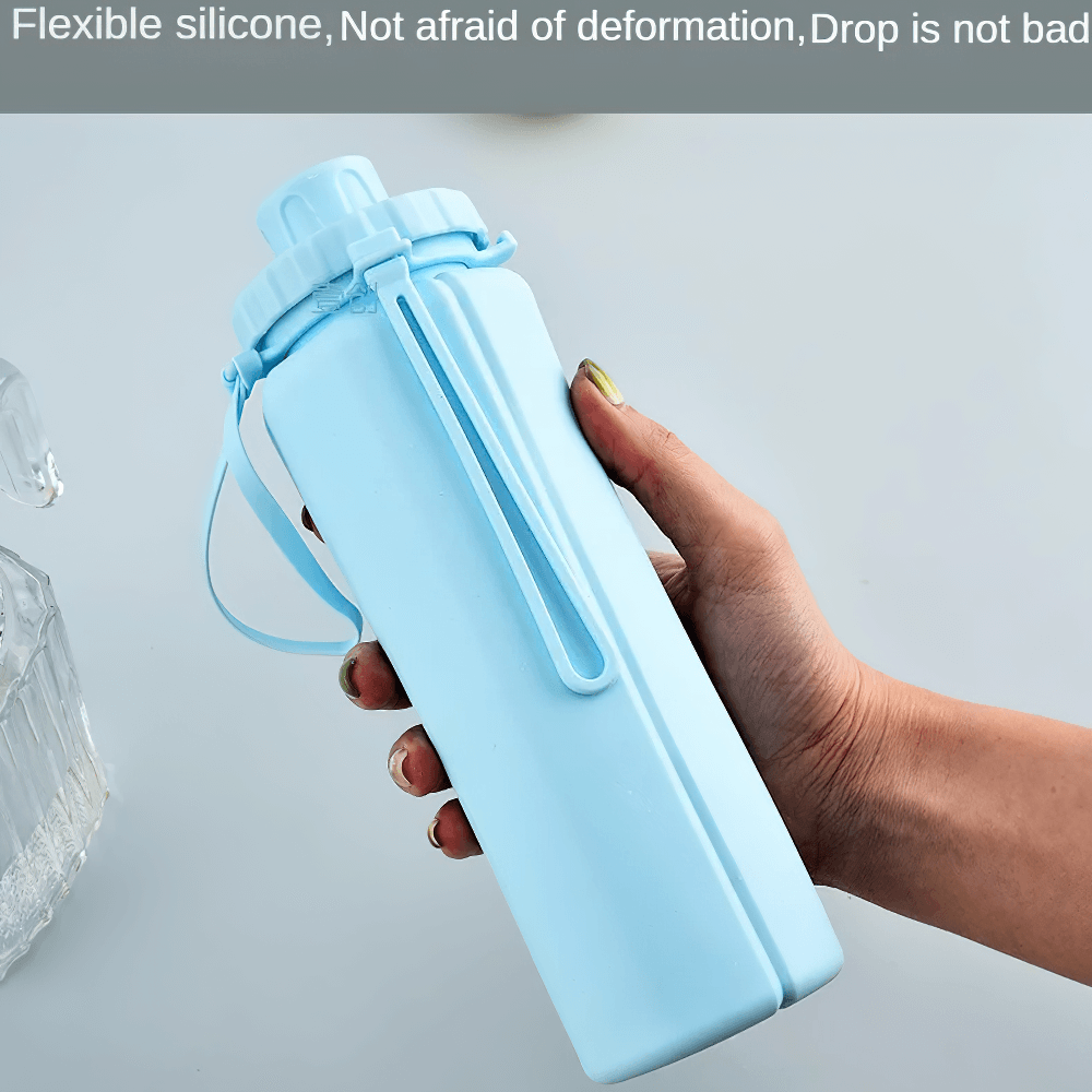 Hand holding Portable Collapsible Bottle for Travel and Gym - SF3490, flexible blue silicone design with leakproof lid.