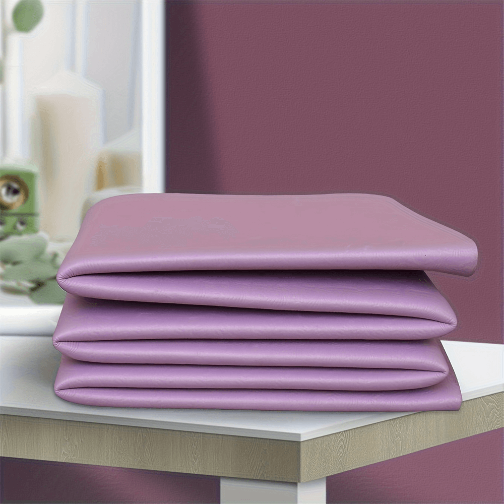 Folded lavender portable yoga mat for exercises, offering non-slip surface and easy storage, perfect for home, gym, or travel.