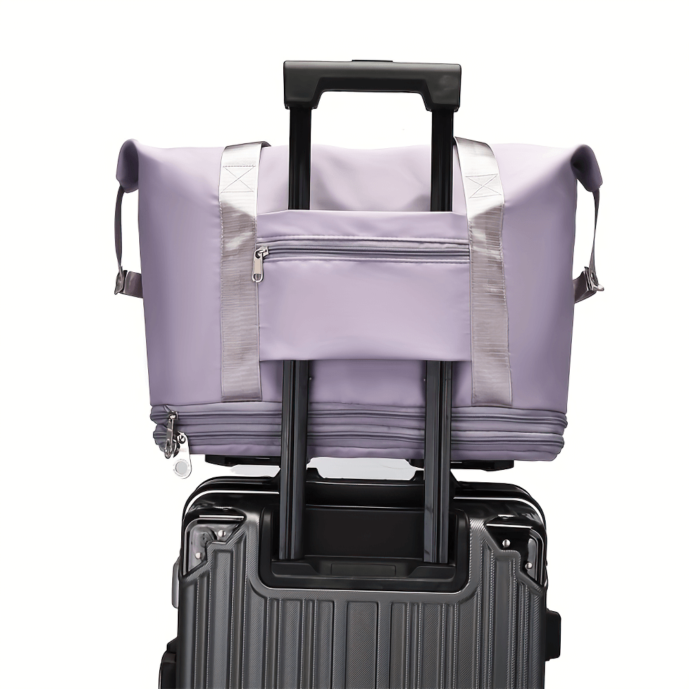 Portable foldable travel luggage bag SF2671 with wheels, expandable storage, and compact design for easy transport, in lilac color.