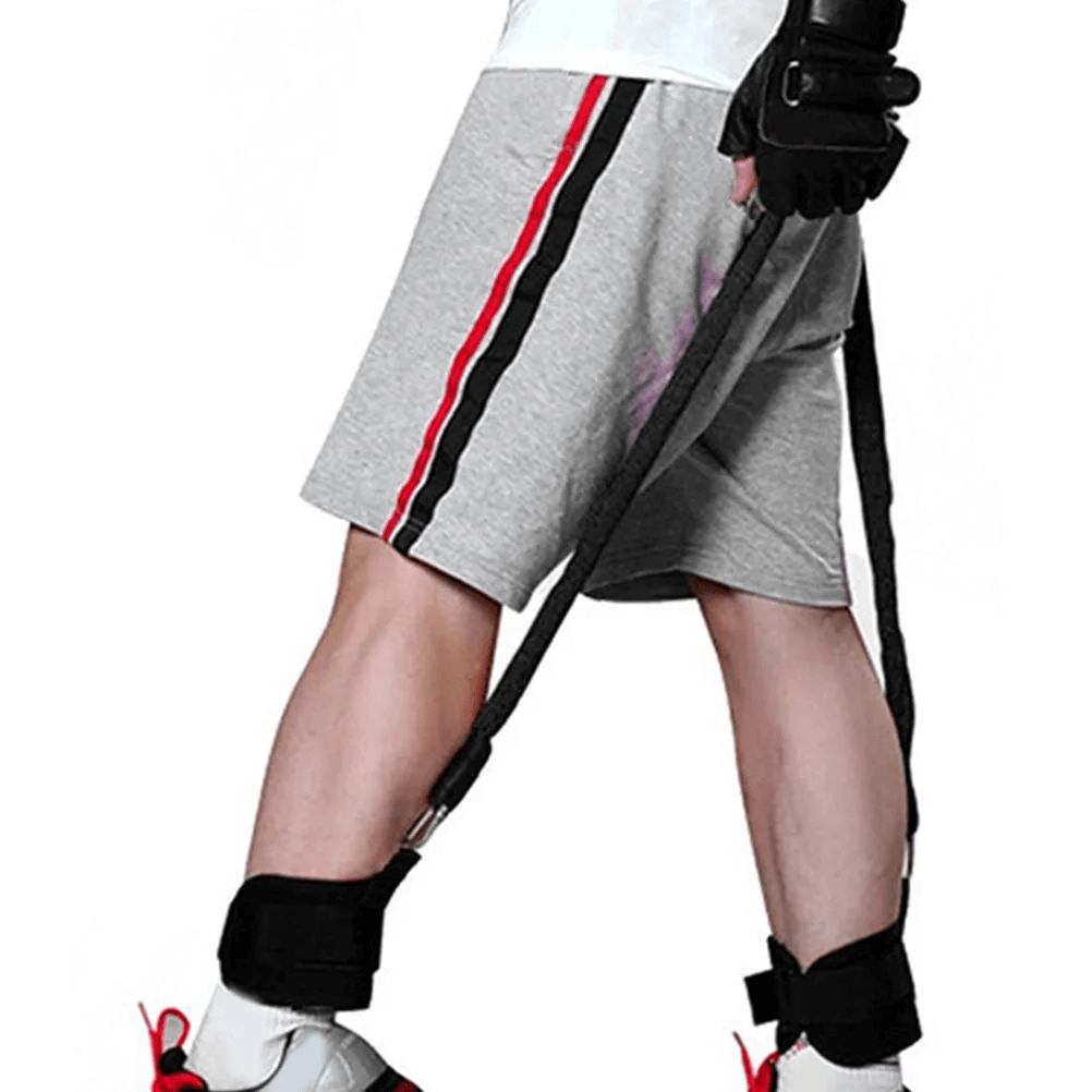 Person using portable resistance ankle bands for agility and core training, showcasing adjustable cuffs and durable tubes during a workout.