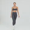 Woman modeling Exposed Seam High Waist Yoga Leggings - SF4056 in grey, showcasing fitness fashion with sleek silhouette and supportive high waist.