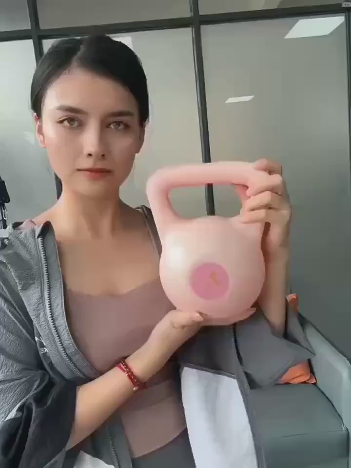 Woman holding an adjustable pink water-filled kettlebell for versatile home workouts and strength training.