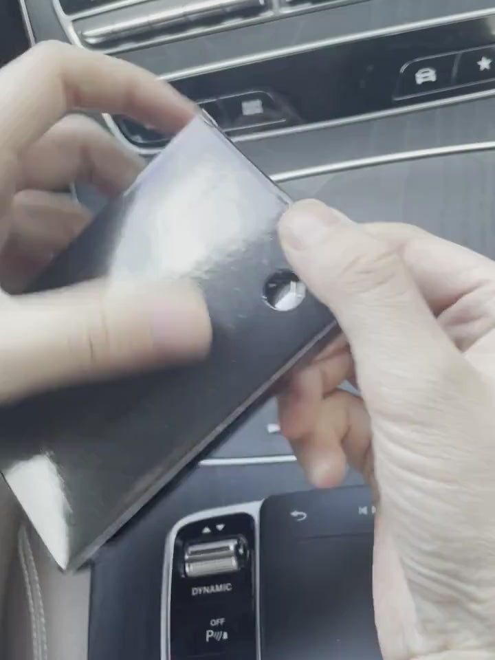 Person holding Slim RFID Blocking Metal Credit Card Holder Case SF2674 in car, showcasing sleek aluminum design and secure features.