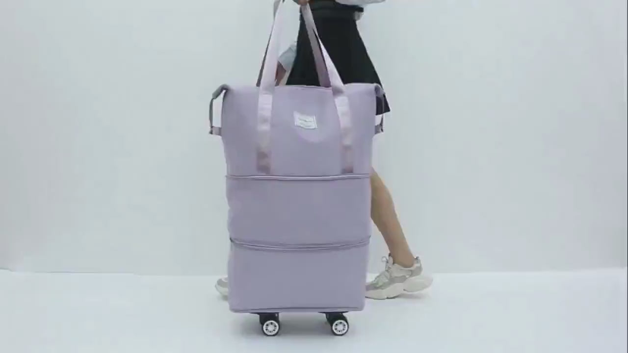 Portable foldable travel luggage bag with wheels, durable and expandable, perfect for effortless transport and secure packing.