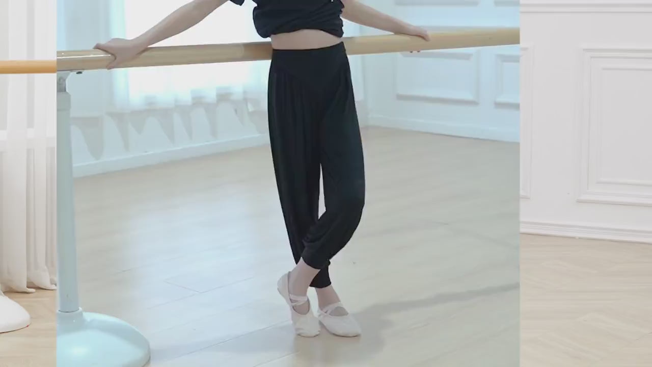 Girl wearing Girls High Waist Ballet Jogger Pants for Dance - SF3930 at dance studio barre, showcasing breathable design and fit.