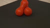 Peanut-shaped spiky massage ball for muscle relief, ideal for back and body therapy, featuring 360° hedgehog bump design.