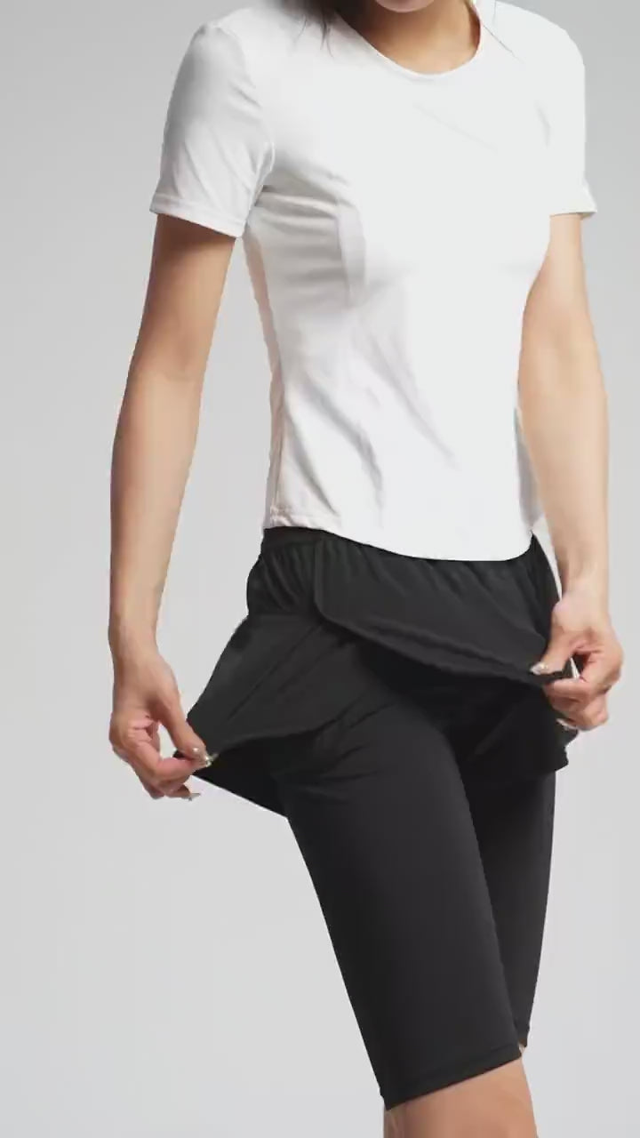 Women's Yoga Shorts with Built-In Skirt Layer - SF3799 showcasing sleek design and elastic waist for yoga and gym activities.