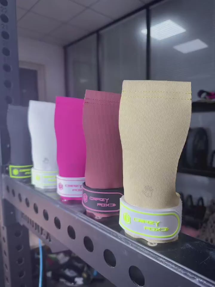 Colorful Gym Hand Grips with Wrist Strap Support - SF3518 on display shelf in fitness store.