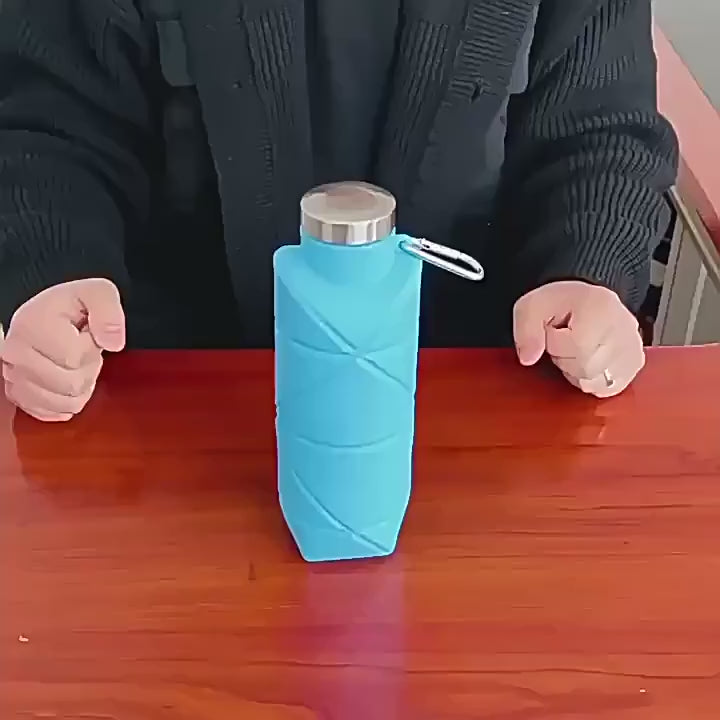 700ml Foldable Silicone Water Bottle for Outdoor - SF3503 with carabiner, perfect for sports, hiking, durable BPA-free material.