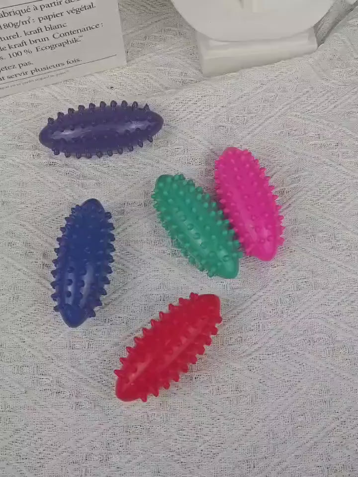 Colorful hedgehog massage balls for stress relief and muscle tension.