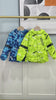 Kids Hooded Windbreaker Jacket with Camo Print - SF3847 in bright blue and green hanging on a rack