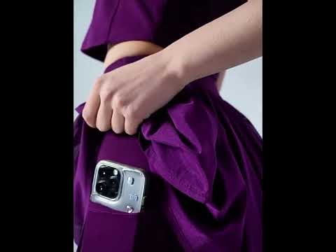 Female Pleated Tennis Skort with Built In Shorts - SF4577 showing pocket holding a smartphone.