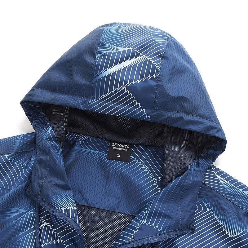 Close-up of blue printed lightweight men's windbreaker jacket with hood, SF1946, featuring breathable fabric, perfect for outdoor activities.