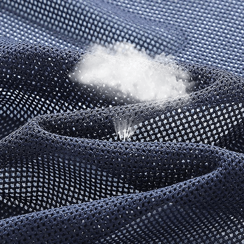 Close-up of breathable polyester fabric of men's windbreaker, showcasing its quick-drying and stylish mesh texture.