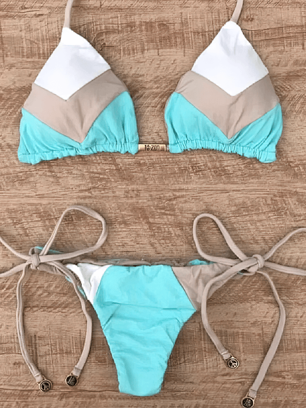 Chic printed lace-up swimsuit with patchwork design, low-waist, and comfy padded top. Ideal for pool parties and beach fun.