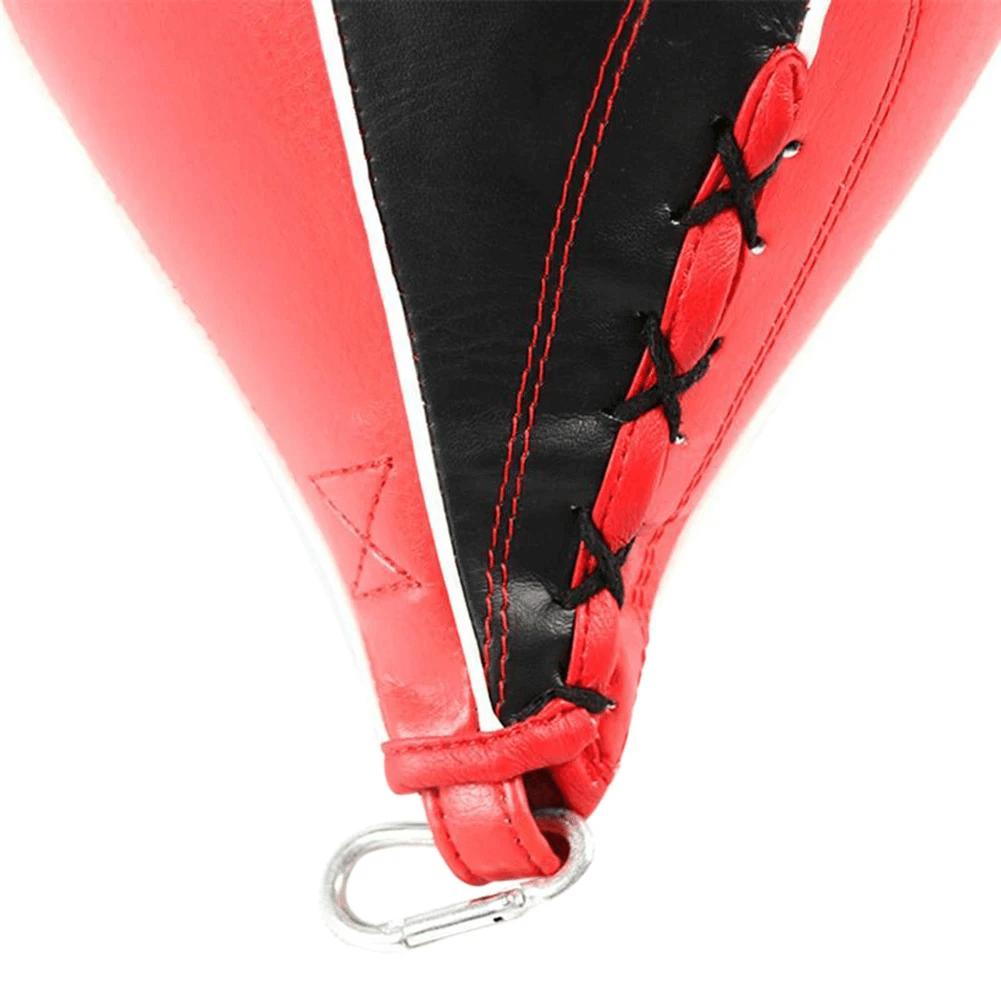 Close-up of PU leather speed ball for boxing and MMA training, featuring durable red and black stitching with a metal hook for hanging.