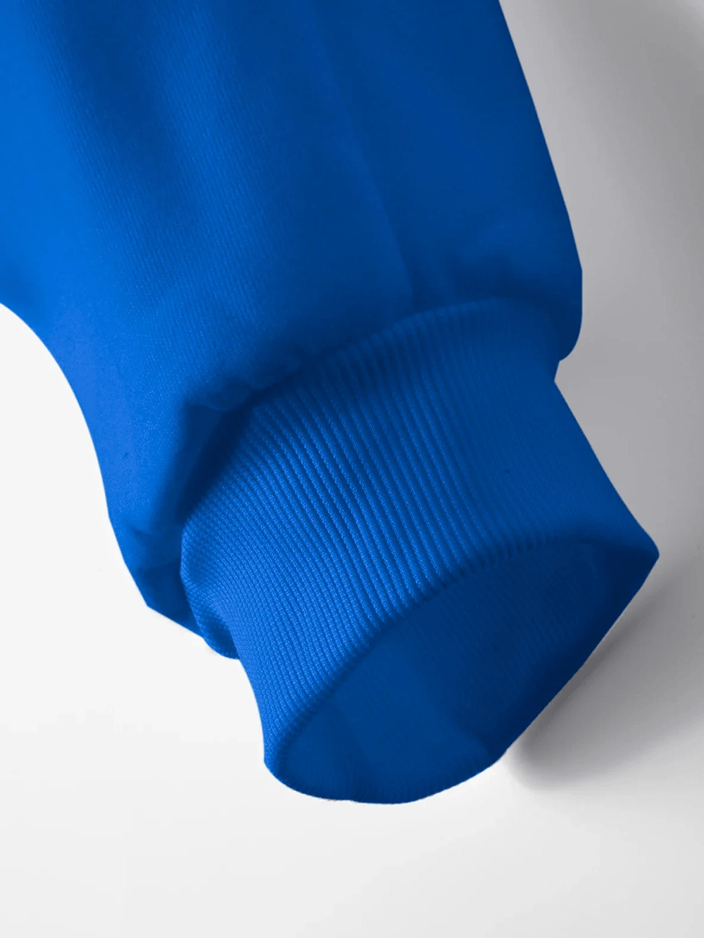 Close-up of the ribbed cuff of the Pullover Hoodie with Drawstring and Pocket - SF4650 in vibrant blue.