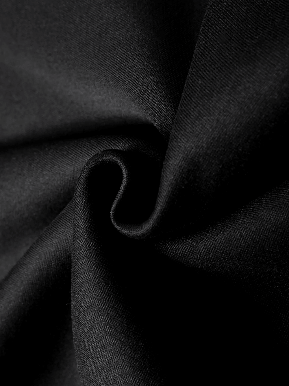 Close-up of black fabric showcasing the soft texture for the Quarter Zip Pullover Hoodie with Utility Pocket - SF4605.