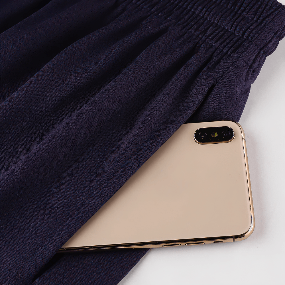 Alt Tag: Quick Dry Basketball and Training Loose Shorts - SF4455 pocket detail holding smartphone, quick-dry loose fit court shorts