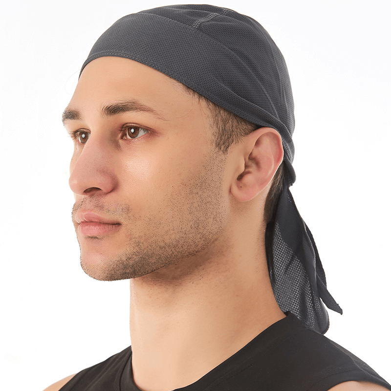 Man wearing Quick Dry Cycling Cap with UV protection, ideal for outdoor activities like cycling and hiking, in lightweight polyester.