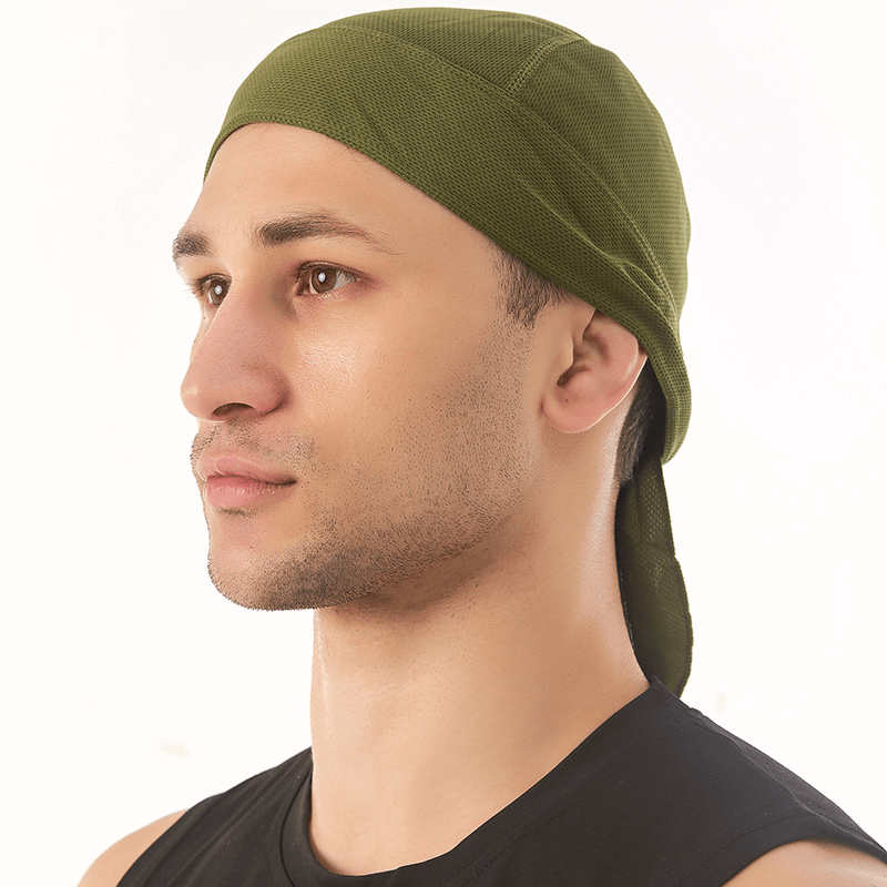 Man wearing green Quick Dry Cycling Cap with UV protection and sweat control, ideal for cycling and outdoor activities.