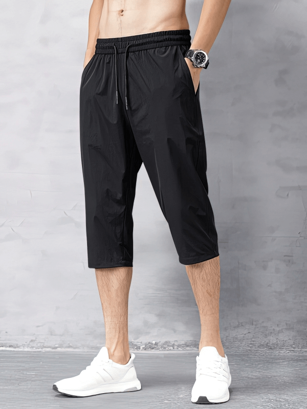 Quick Dry Lightweight Men's Extended Shorts in black, knee-length with side pockets, perfect for comfort and movement, style SF1342.